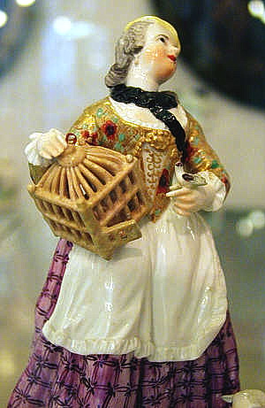 Schäferin mit Vogelkäfig